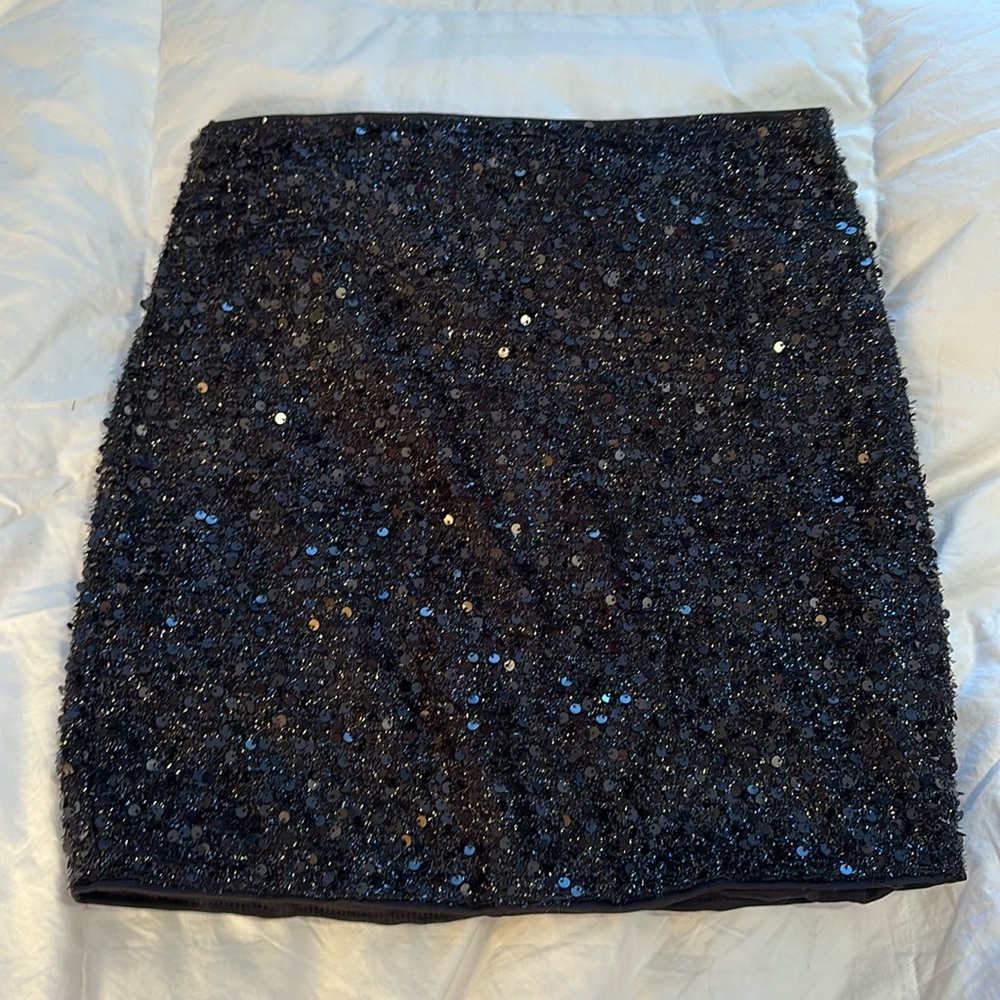 Black sparkly mini skirt from SHEIN. Size medium